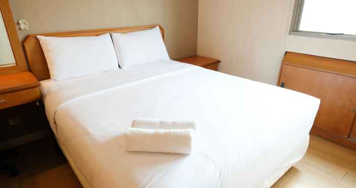 ห้องนอน Homey and Extra Spacious 2BR at Kondominium Puncak Marina Apartment By Travelio