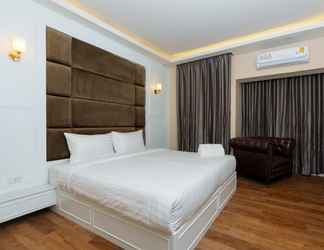 Kamar Tidur 2 Calinton Hotel