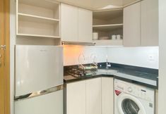 Common Space 5 Comfort and Elegant 2BR Apartment at The Mansion Kemayoran By Travelio