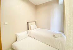 Bedroom 3 Comfort and Elegant 2BR Apartment at The Mansion Kemayoran By Travelio