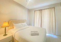 Bedroom 2 Comfort and Elegant 2BR Apartment at The Mansion Kemayoran By Travelio