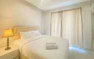 Bedroom 2 Comfort and Elegant 2BR Apartment at The Mansion Kemayoran By Travelio