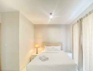 Bedroom 2 Comfort and Elegant 2BR Apartment at The Mansion Kemayoran By Travelio