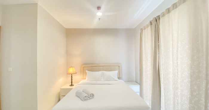 Bedroom Comfort and Elegant 2BR Apartment at The Mansion Kemayoran By Travelio