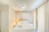 Bedroom Comfort and Elegant 2BR Apartment at The Mansion Kemayoran By Travelio