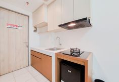 Common Space 3 Restful and Simply Studio at Akasa Pure Living BSD Apartment By Travelio