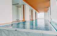 Swimming Pool 6 Gorgeous and Tidy 1BR Apartment at The Smith Alam Sutera By Travelio