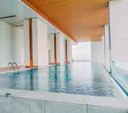 Swimming Pool 6 Gorgeous and Tidy 1BR Apartment at The Smith Alam Sutera By Travelio