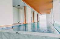 Swimming Pool Gorgeous and Tidy 1BR Apartment at The Smith Alam Sutera By Travelio