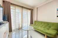 Common Space Cozy and Homey 2BR at Gateway Pasteur Apartment By Travelio