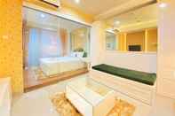 Lobby Comfy and Elegant 1BR at Dago Suites Apartment By Travelio