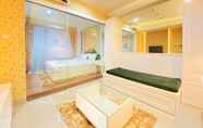 Lobi 2 Comfy and Elegant 1BR at Dago Suites Apartment By Travelio