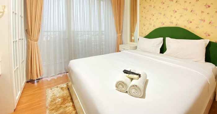 Kamar Tidur Comfy and Elegant 1BR at Dago Suites Apartment By Travelio