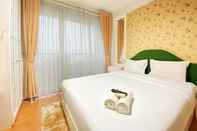 Kamar Tidur Comfy and Elegant 1BR at Dago Suites Apartment By Travelio