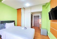 침실 2 Homey Studio Apartment at Oxford Jatinangor By Travelio