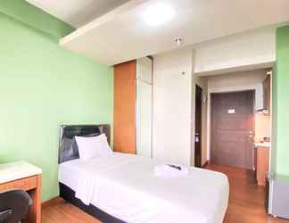 Bedroom 2 Minimalist Studio Apartment at Oxford Jatinangor By Travelio