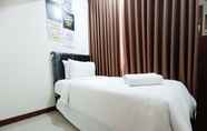 Bedroom 2 Luxury and Tidy 2BR at Vida View Makassar Apartment By Travelio