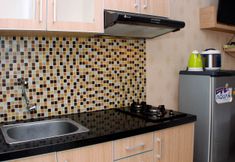 Ruang untuk Umum 4 Comfort and Tidy Studio at 33th Floor Bassura City Apartment By Travelio