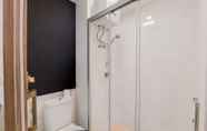 In-room Bathroom 6 Modern and Fully Furnished 2BR Apartment at Sky House BSD By Travelio