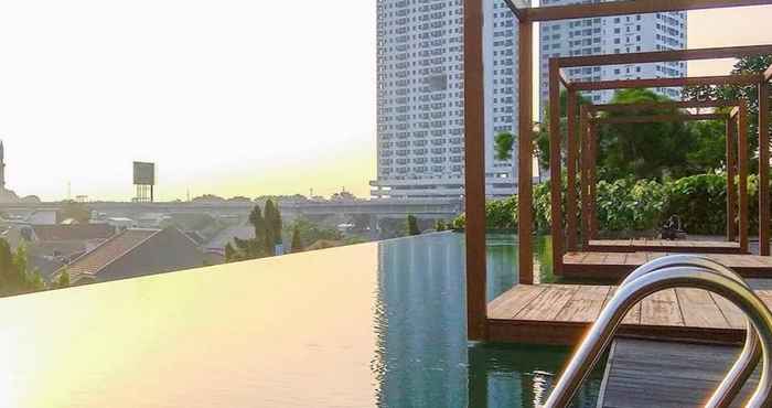 Swimming Pool Apartemen Grand Kamala Lagoon by Hana