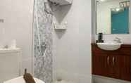 In-room Bathroom 6 Nice and Enjoy 2BR at Tokyo Riverside PIK 2 Apartment By Travelio