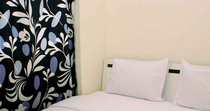 Kamar Tidur Comfortable and Modern Look 2BR at 26th Floor Meikarta Apartment By Travelio