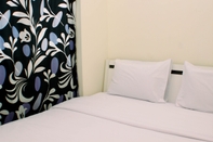 ห้องนอน Comfortable and Modern Look 2BR at 26th Floor Meikarta Apartment By Travelio