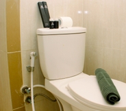 In-room Bathroom 5 Comfortable and Modern Look 2BR at 26th Floor Meikarta Apartment By Travelio