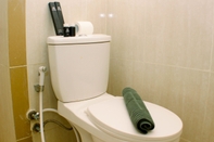 In-room Bathroom Comfortable and Modern Look 2BR at 26th Floor Meikarta Apartment By Travelio