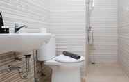 Toilet Kamar 5 Spacey and Best Choice 2BR Apartment at Puncak Bukit Golf Surabaya By Travelio