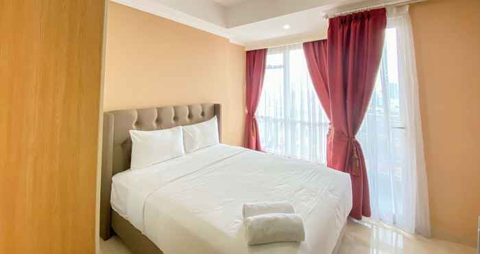Bedroom Homey and Nice Designed Studio at Menteng Park Apartment By Travelio