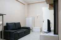 Common Space Tidy and Cozy Living 2BR Green Bay Pluit Apartment By Travelio