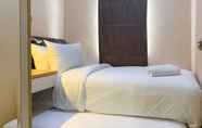 Kamar Tidur 2 Tidy and Cozy Living 2BR Green Bay Pluit Apartment By Travelio