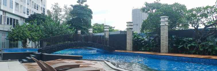 Lobby Relax and Nice 1BR at Grand Sungkono Lagoon Apartment By Travelio