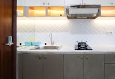 Common Space 3 Relax and Nice 1BR at Grand Sungkono Lagoon Apartment By Travelio