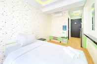 Kamar Tidur Good and Modern Studio Apartment at Grand Asia Afrika By Travelio