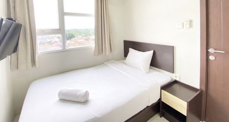 Bedroom 2 Cozy and Deluxe 2BR Apartment at Skyland City Jatinangor By Travelio
