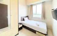 Bedroom 2 Cozy and Deluxe 2BR Apartment at Skyland City Jatinangor By Travelio