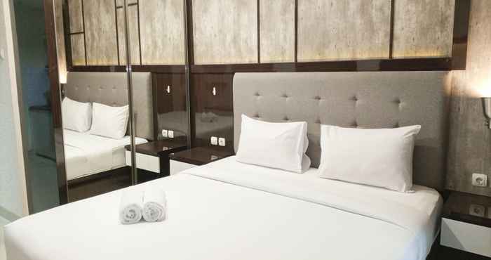 Bedroom Luxury and Deluxe Studio at Patraland Amarta Apartment By Travelio