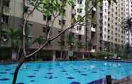 Swimming Pool 6 Relax and Best 1BR Apartment at Gateway Ahmad Yani Cicadas By Travelio