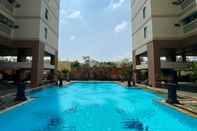 Swimming Pool Homey and Comfort 3BR at Pesona Bahari Apartment By Travelio