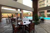 Lobby Homey and Comfort 3BR at Pesona Bahari Apartment By Travelio