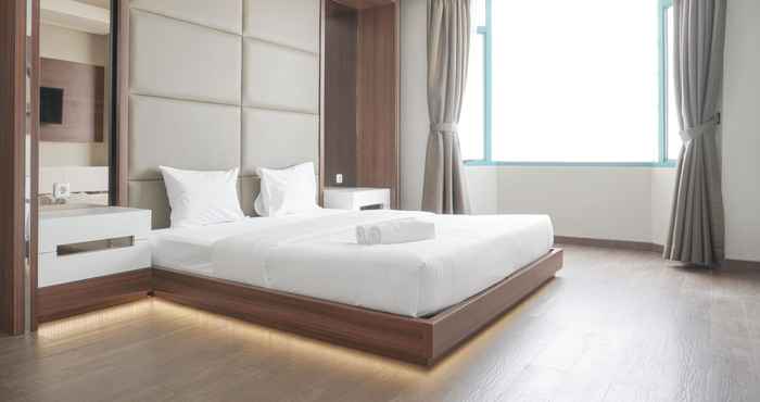 Kamar Tidur Homey and Comfort 3BR at Pesona Bahari Apartment By Travelio