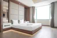 Bedroom Homey and Comfort 3BR at Pesona Bahari Apartment By Travelio