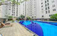 Kolam Renang 7 Good Deal and Minimalist 2BR at Bassura City Apartment By Travelio