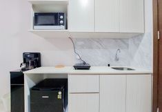 Ruang Umum 4 Elegant and Nice Studio near Campus at Pacific Garden Alam Sutera Apartment By Travelio