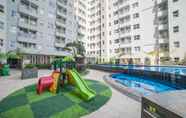 Swimming Pool 7 Nice and Fancy 2BR Apartment at Parahyangan Residence By Travelio