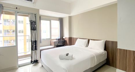 Bedroom 2 Modern Look Studio at LRT City Jatibening Apartment By Travelio