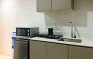 Common Space 4 Comfort and Clean 1BR at Gold Coast Apartment By Travelio