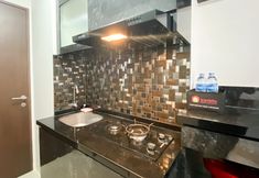 Ruang Umum 5 Modern 12th Floor Studio at Transpark Juanda Bekasi Timur Apartment By Travelio